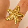 Bague style océan plaquée or en acier inoxydable avec design étoile de mer texturée - Style Ouvert Étoile de Mer Granulaire (A-825) / Or