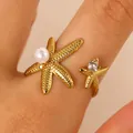 Bague étoile de mer élégante en acier doré avec perle blanche et accents de zircone - Style Ouvert Double Étoile de Mer Perle Zirconia (2155) / Or