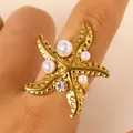 Élégante bague étoile de mer dorée en acier inoxydable ornée de perles et de zircon - Style Étoile de Mer Texturée Perle Zirconia (A-315) / Or