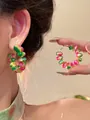 Close-up of colorful marbled beaded hoop earrings showing the vibrant textures and colors - Tie-Dye Beaded Hoop (HE33529-1-) / Pink-Green (Silver Post)