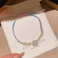 Bracciale in corda intrecciato a mano con ciondolo a cerchio in giada - Rosa-Blu-Verde