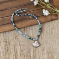Detailed view of a beach-style beaded necklace with a metallic shell and pearl pendant. - 5# Beaded Necklace (Shell Pearl Decoration) / Silver-Blue
