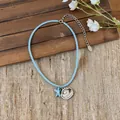 Close-up of light blue beaded necklace with silver shell and blue starfish charms - 3# Beaded Necklace (Bow Shell Pendant) / Silver-Blue