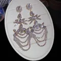 Exquisite luxury long geometric tassel earrings with clear crystals in gold-tone finish. - Silver Post Water Drop Tassel Style (63)