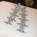 Glamorous long geometric tassel earrings featuring sparkling white rhinestones in silver - Silver Post Sharp Water Drop Tassel Style (67)