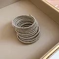 Elegant multi-layer wrap bracelet with silver metallic beads in a retro minimalist style - Round Beads / Silver