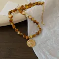 Vintage bohemian choker necklace with amber geometric beads and gold coin pendant - Round Coin Embossed Style / 51# Necklace-Gold-Coffee