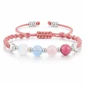 Bracelet tissé rose fait main avec perles de lune et breloques de lune argentées. - Style de perles mélangées tressées roses