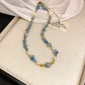 Retro Bohemian necklace with blue crystal stones and pearls in gold finish. - Sky Blue Broken Stone Pearl Style / 43# Necklace-Gold-Blue
