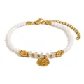 Elegant 18K gold plated stainless steel bead bracelet with a hammered disc pendant. - White Disc Charm Beaded Chain (B0700) / Gold