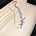 Vintage Bohemian necklace featuring blue crystals and white beads on a jewelry tray - Shell Bead Broken Stone Splicing Style / 41# Necklace-Blue-White