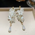 Elegant French style flower tassel stud earrings featuring delicate white teardrop pearls - Flower Tassel Style
