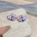 Elegant detail view of handmade purple floral earrings with pearl and crystal accents - Purple Flower (HE32758) / Purple