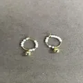 Elegant handmade white pearl bead hoop earrings featuring a polished gold sphere pendant - Hoop Dangle Style / Gold-White