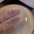 Close-up of pink heart studs and elegant bow teardrop earrings in Korean style - Heart Zirconia Bowknot Ear Jewelry (19#) / Four-Piece Set / Pink
