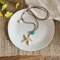 Bohemian starfish necklace accessory with seashell details for summer vacation style - Starfish / Brown
