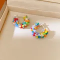 Detailed view of colorful beaded wrap hoop earrings inside a cream jewelry box - Hoop-Silver-Multicolor
