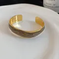 Elegant gold irregular metal cuff bracelet with unique brown marble texture inlay - Irregular Textured / Gold with Coffee Texture