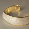 Irregular gold cuff bracelet with white pearlescent inlay for a minimalist luxury look - Wavy Texture Style / Gold - White Marble Texture