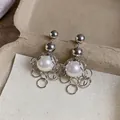 Detailed view of French vintage silver ring tassel stud earrings with large white pearls - Round Fringe Pearl (HE33724) / Silver-White
