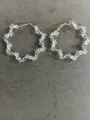 Elegant gold-tone twisted hoop earrings featuring clear faceted crystal beads for women - Twisted Style / Gold-White