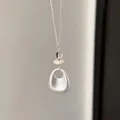 Macro view of minimalist oval pendant necklace with stone and glass beads detail - Oval Stone Glass Style (HN12319) / Silver