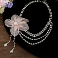 Macro shot of the delicate pink chiffon flower and sparkling rhinestone tassels - Necklace (Silver-Pink)