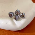 Macro view of a stylish faceted grey stone bow ring with sparkling crystal details - Open Ring (HR3601) / Gray (Silver Hardware)