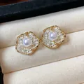 Exquisite detail of 18K gold plated flower stud earrings featuring elegant white pearls. - Style 2 / Gold
