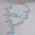 Detail of vintage style necklace and earrings set with blue teardrop stones - Necklace And Earrings Set / Blue