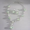 Exquisite detail of vintage green teardrop gemstone necklace and earring jewelry set - Necklace And Earrings Set / Green
