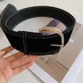 Detail of black leather belt featuring white zigzag stitching and silver buckle - Black Belt