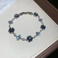 Elegant silver-tone bracelet featuring blue zircon flowers and sparkling marquise crystals. - 67# Bracelet / Silver Dark Blue Light Blue