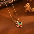 Detail shot of a gold heart pendant necklace with colorful stones and snake chain - Multicolor Bead Heart Snake Chain (24030702)
