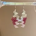 Elegant hollow butterfly tassel ear hook earrings with gradient pink and red finish - Pink White