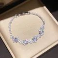 Detail view of a sparkling zircon bracelet in a jewelry box showing fine craftsmanship. - Style 6 Bracelet / Silver White