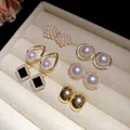 Elegant set of 6 pairs of pearl and gold finish stud earrings displayed on jewelry tray - Silver Earring Post Style (12-Piece) / Gold & White