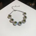 Elegant silver-toned tennis bracelet featuring sparkling round olive green zircon stones - 31# Bracelet / Silver/Green