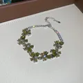 Elegant silver bracelet featuring sparkling green zircon flowers for a minimalist luxury look - 35# Bracelet / Silver/Green