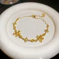 Elegant gold finish bracelet featuring sparkling yellow zircon flower charms for women - 57# Bracelet / Gold Yellow