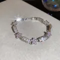 Elegant silver bracelet featuring pink zircon flowers and sparkling white rhombic stones - 58# Bracelet / Silver Pink