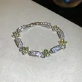 Elegant silver bracelet with sparkling green flower and clear rectangular crystals - 61# Bracelet / Silver/Green