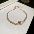 Double row gold-plated bracelet with multi-colored zircon flower centerpiece elegant jewelry - 62# Bracelet / Gold Multicolor