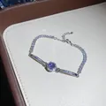 Elegant silver bracelet featuring a round purple zircon centerpiece with pavé accents - 70# Bracelet / Silver Purple