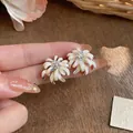 Elegant cream enamel flower stud earrings with silver needle minimalist design for women - Silver-White