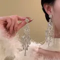 Detailed view of oversized zircon drop tassel earrings with sparkling rhinestones - Dense Tassel Structure (5#)