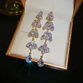 Close-up macro detail of luxury long crystal tassel earrings with sparkling teardrop stones - Luxury Exquisite Multi-Stage (36#)