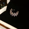 Close-up of 18k gold plated ear cuff featuring sparkling marquise-cut zircons. - Silver-Style 4