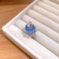 Detailed macro shot of the blue resin pudding ring with exquisite zircon side stones - Ring / Silver-Blue