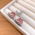 Close-up detail of pink resin pudding stud earrings with colorful zircon stone accents - Stud Earrings / Silver-Pink